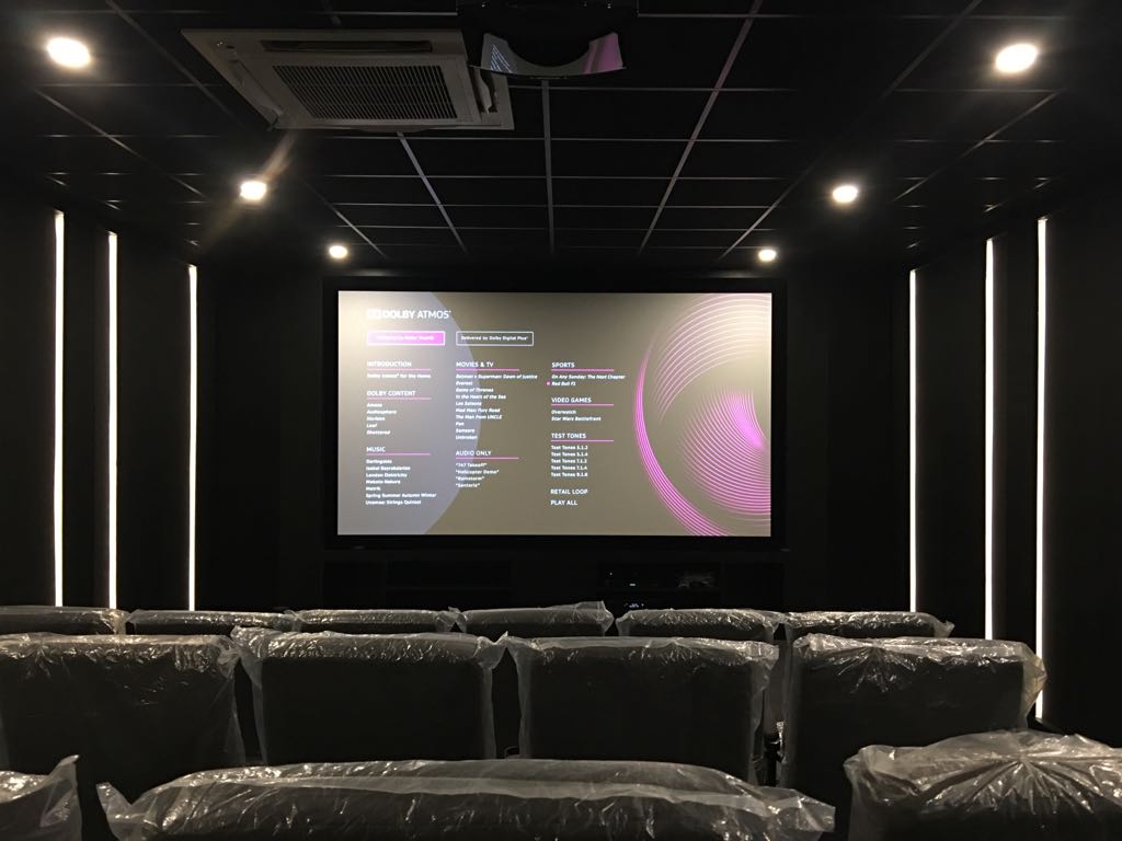ADAC Dolby Atmos Calibration Screen with Vertical LED Pillars and Tiered Seating