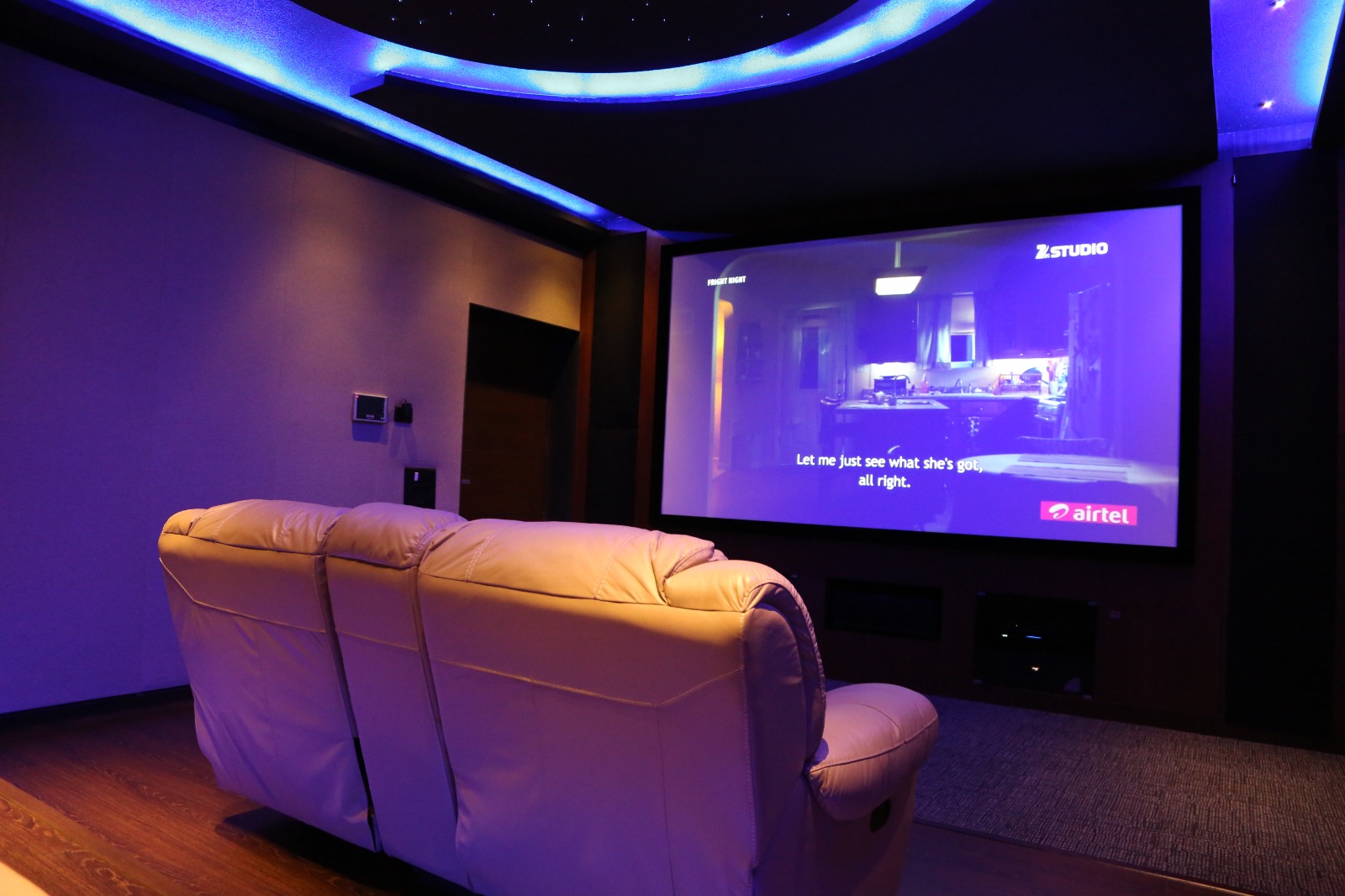 Turnkey Master Cinema Suite with Ambient Architectural Blue Glow and 150-inch Screen